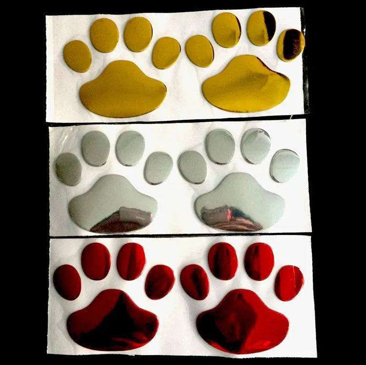 Hand-shaped brush outline car sticker with dog footprints, shown in black colour, measuring 7cm long.