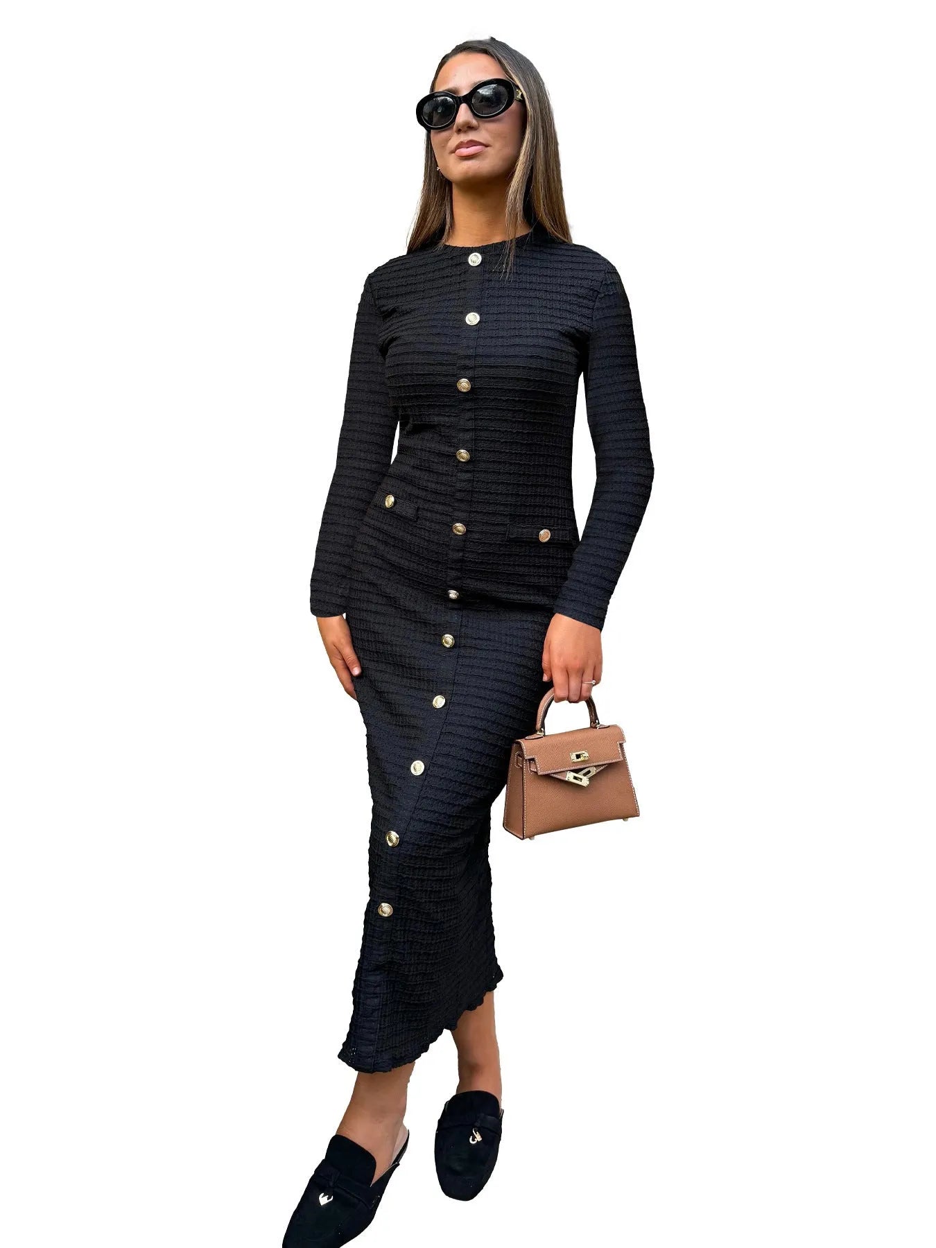 French retro slim fit knitted long-sleeved dress in black with button detail.