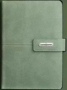 A5 notebook with a PU leather cover, open to show wood-free paper pages.