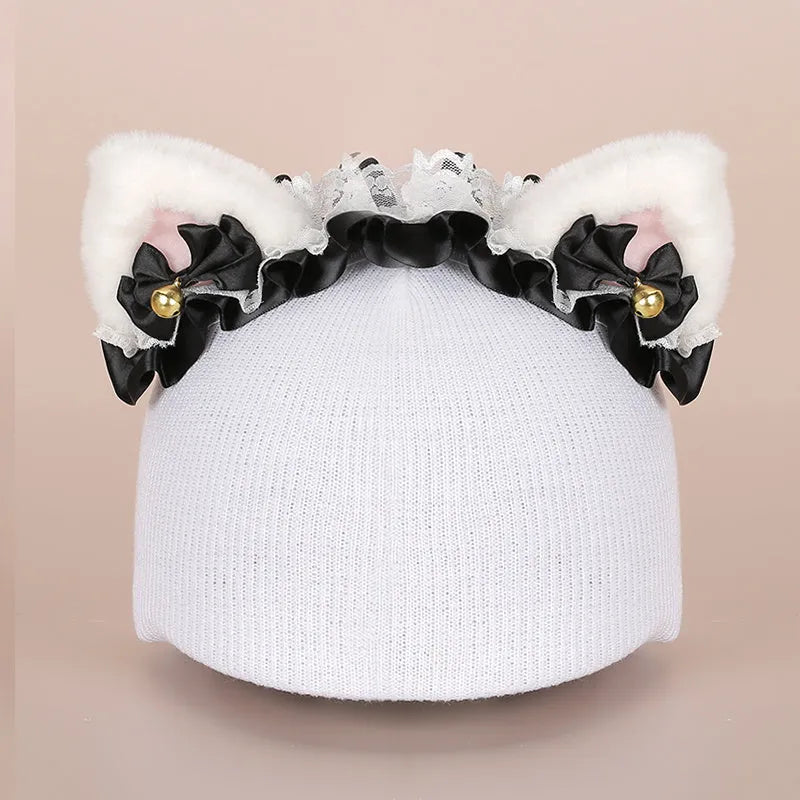 Soft plush ski helmet decoration hat with cartoon design on a blue background.