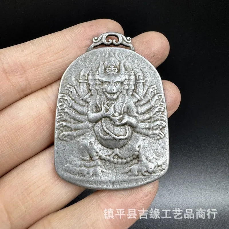 Chinese-style cast iron pendant ornament with Aryaacalanatha Yamantaka geometric design.