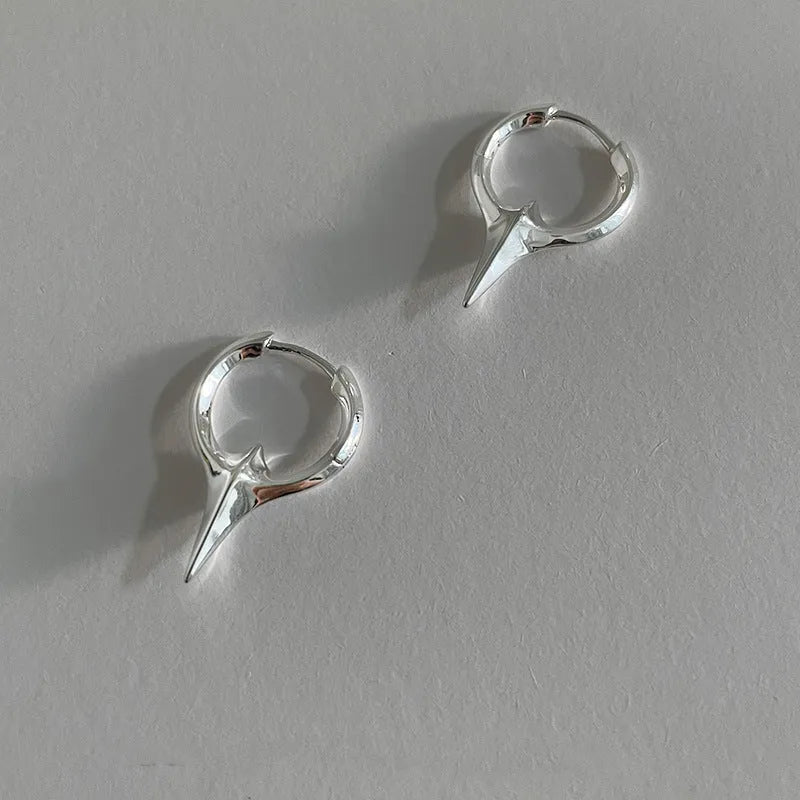 Geometric star-shaped ear clips for women with electroplated platinum finish on copper