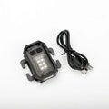Compact USB rechargeable tactical flashlight with a black mounting clip attached to a backpack strap.