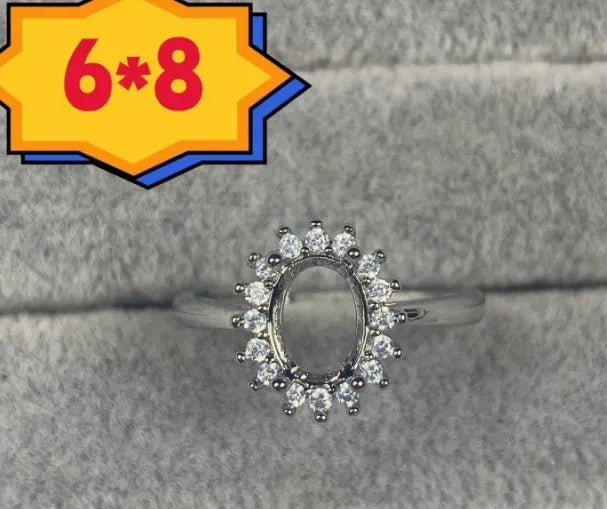 Oval denier ring ornament with open mouth design, 6x8mm stone and five-pointed star detail