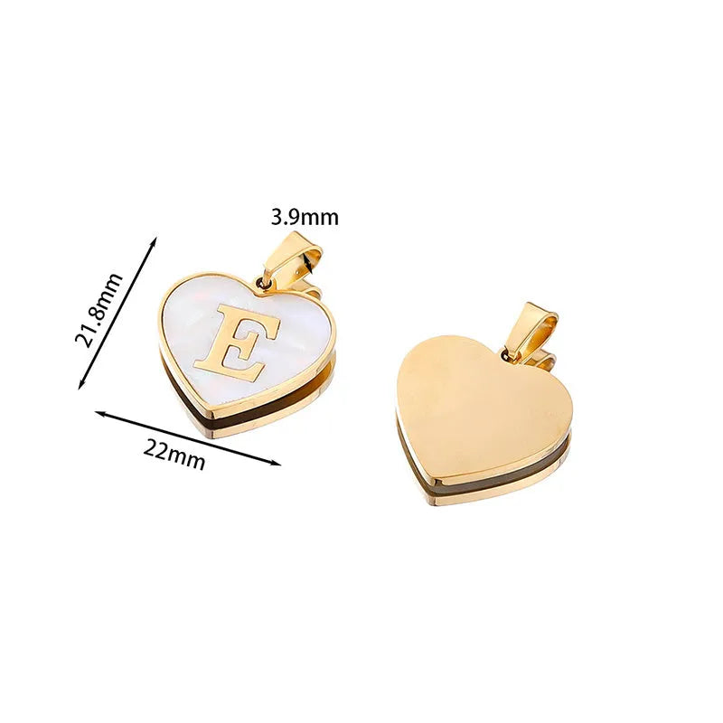 Gold-plated heart-shaped white shell pendant necklace on a stainless steel chain with extendable clasp