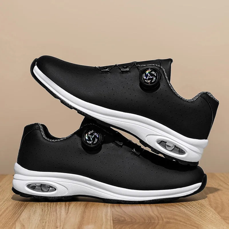 Low top mesh tennis shoes with cross straps and composite sole in black and white