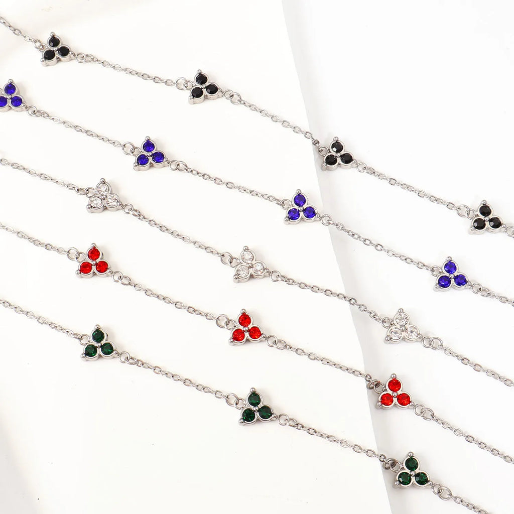 Women's geometric stainless steel bracelet with three-diamond triangle design and zircon stones