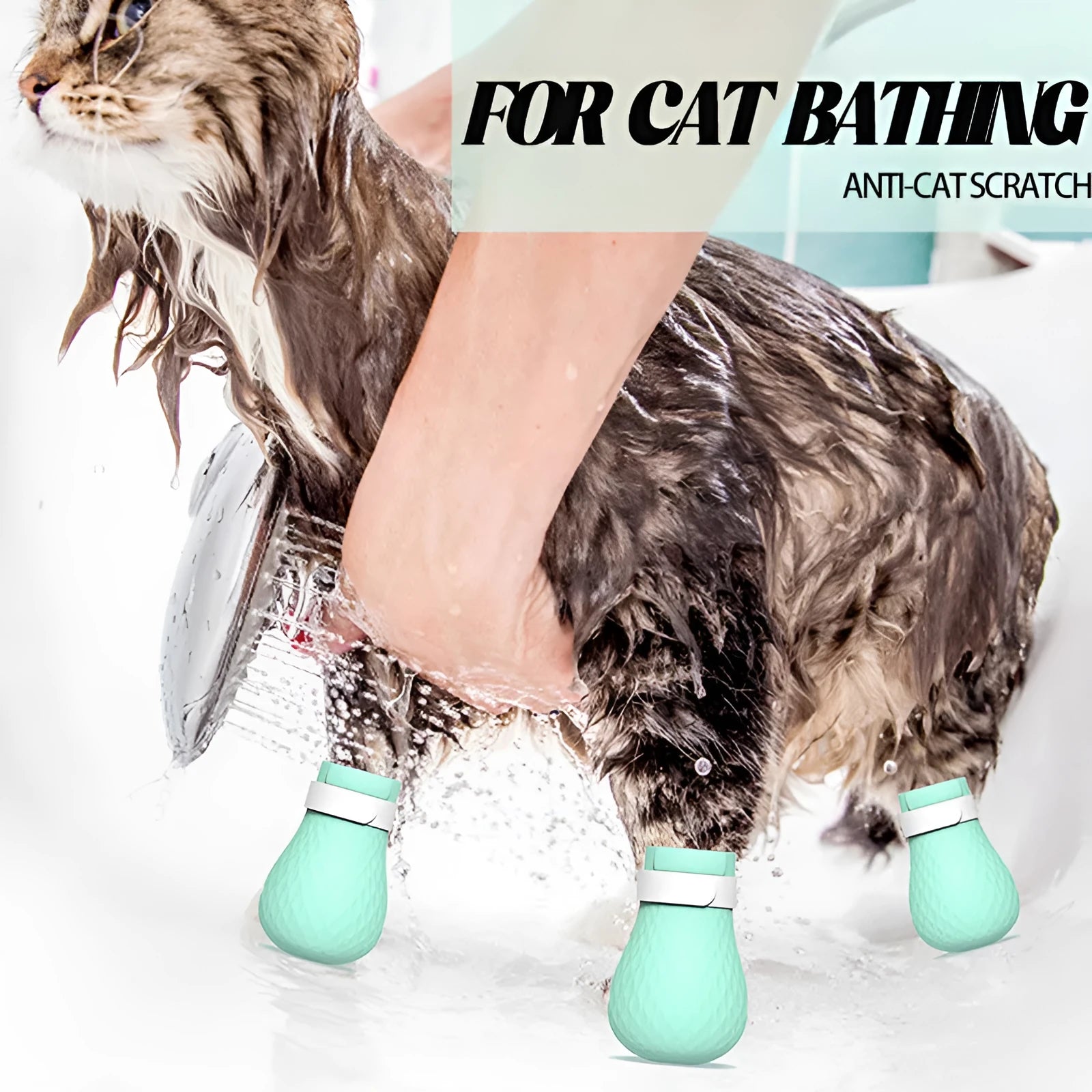 Set of four green silicone cat paw covers used for anti-scratch protection during washing and medicine