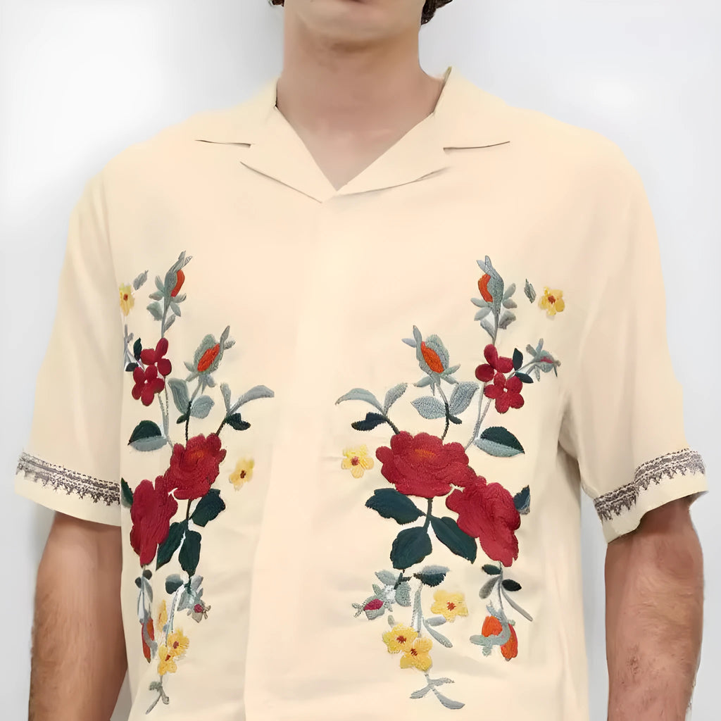 Apricot colour men's shirt with floral print pattern and lapel collar on white background