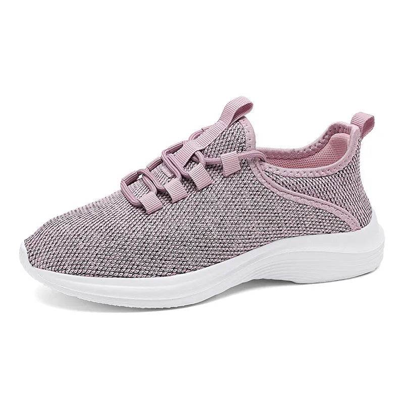 Women's low-top mesh sneakers in black, grey, or pink with breathable flyknit design and EVA sole