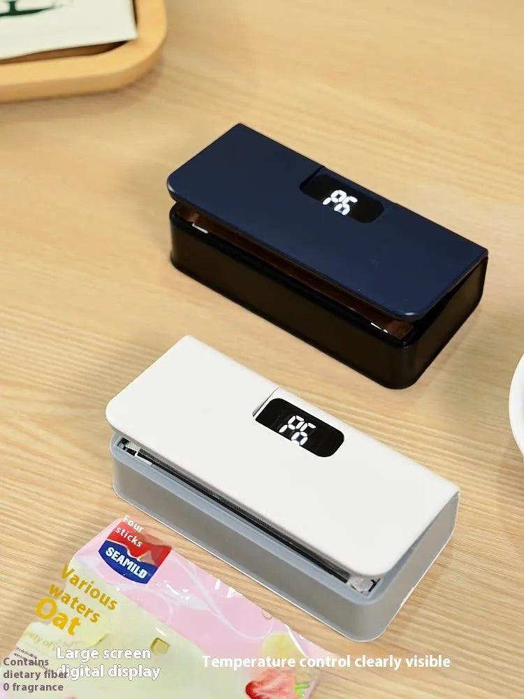 Portable mini sealing machine in blue and white colours measuring 4x3.5x14.4cm