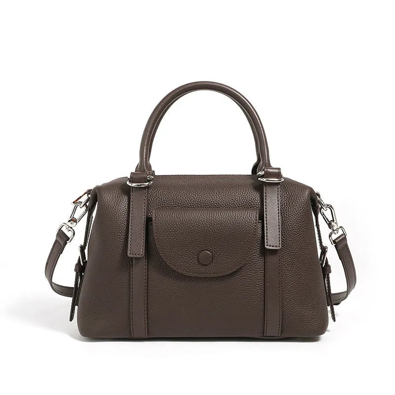 Genuine leather ladies handbag with contrast stitching and lock detail in elephant grey colour