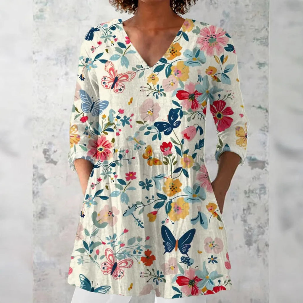 Women's slim fit long sleeve printed top in a retro pattern, made from polyester.