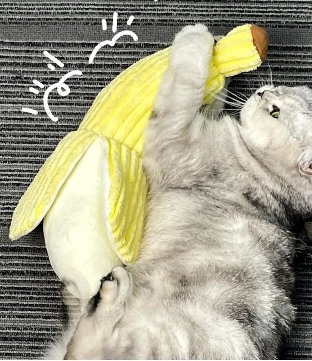 Yellow banana-shaped cat crinkle toy with plush fabric and velvet strip detailing