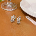 A pair of women's casual diamond-design earrings with a thick gold-plated finish in a choice of colours.