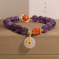 Amethyst crystal bracelet for women with jade safety knot and small flower inlay