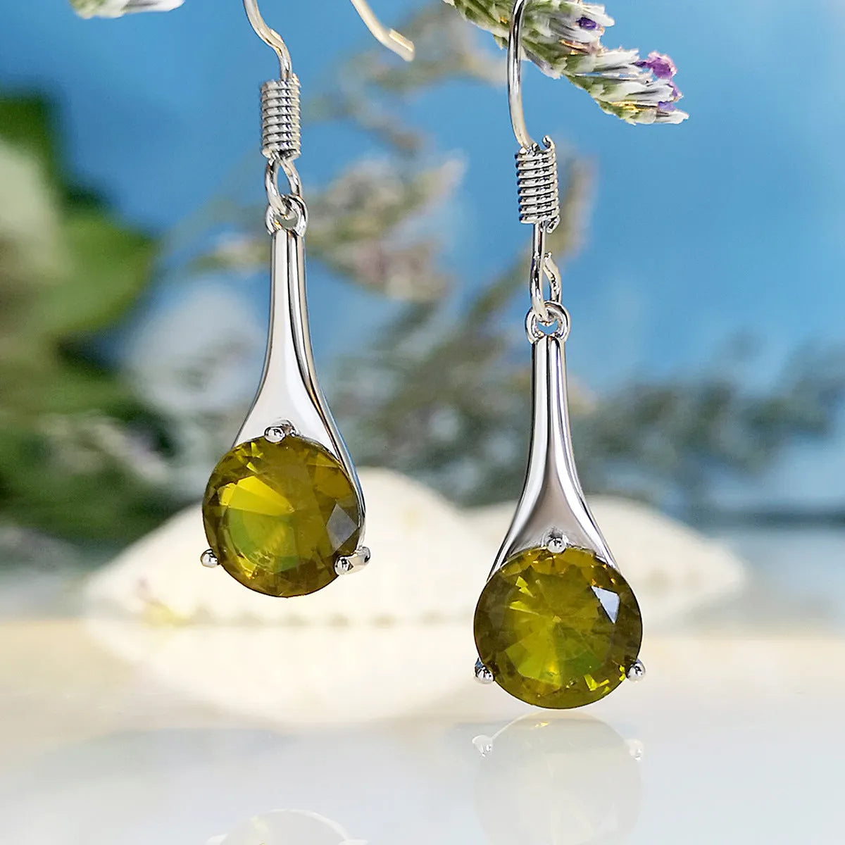 Olive green topaz water drop shaped earrings with electroplated finish and minimalist design