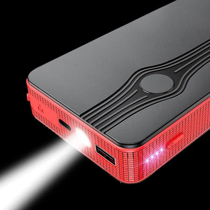 Red K4-E car jump starter and power bank showing its compact size and USB port.