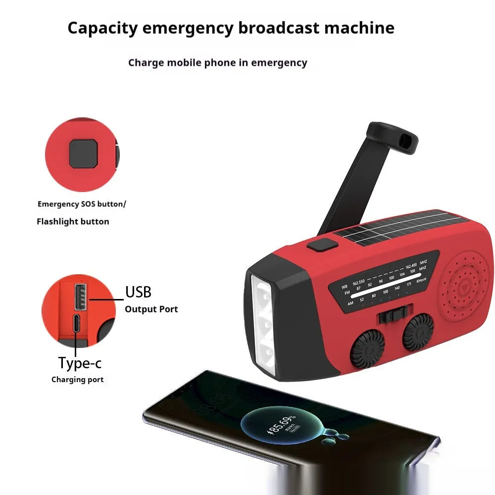 Red rechargeable emergency hand torch with AM/FM radio and wrist strap for disaster preparedness