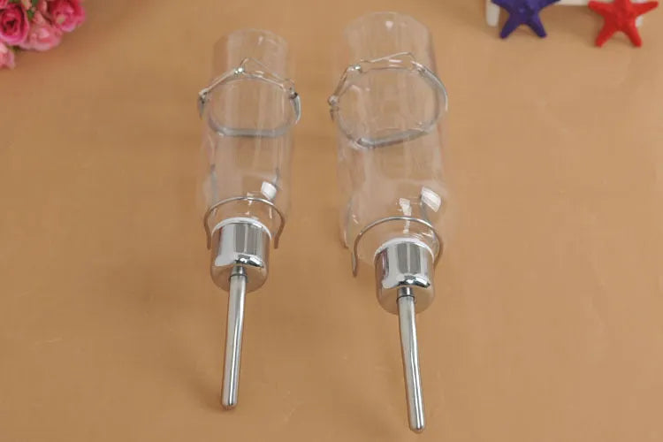 Hanging pet water feeder bottle with stainless steel faucet, transparent natural colour, 180ml or 350ml small animal drinking dispenser