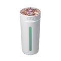 Black wireless air humidifier with colourful LED lights on a car cup holder