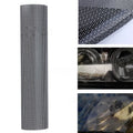 Roll of perforated mesh plastic adhesive film for DIY car wrapping, showing scale next to a 30cm ruler.