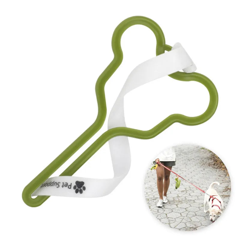 A hands-free dog poo bag holder with a fixed clip and adjustable Velcro strap attached to a dog lead.