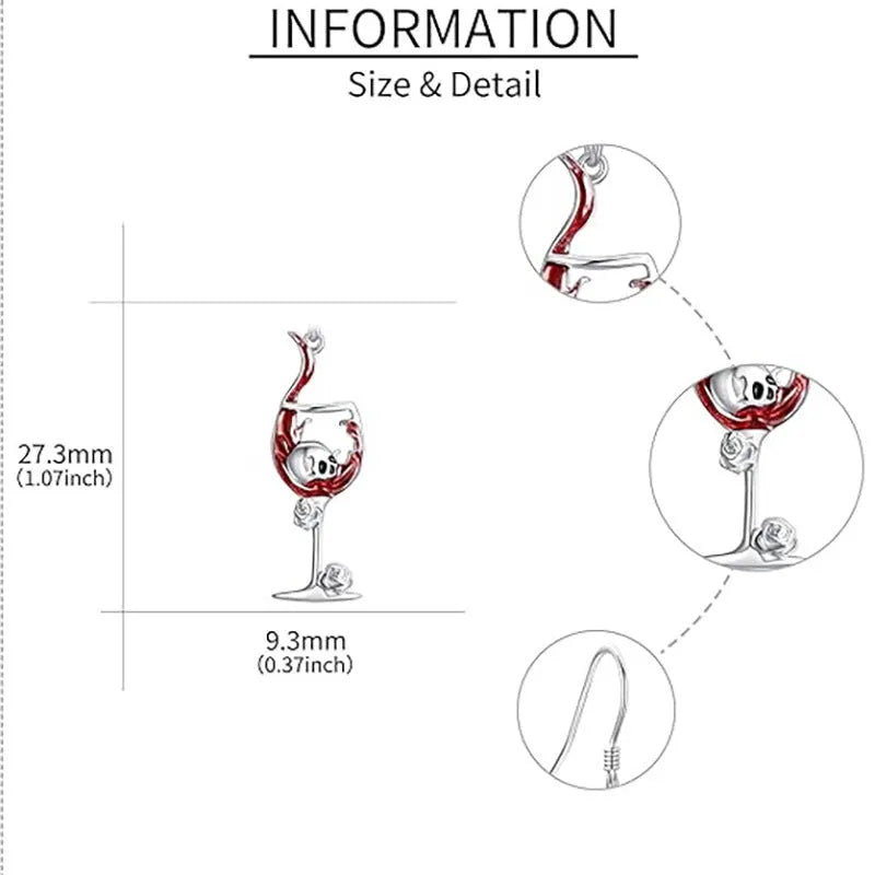 A pair of silver-toned zinc alloy earrings shaped like wine glasses adorned with skull details, on a plain background.