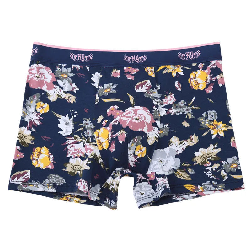 Men's floral print cotton boxer briefs on a white background, showing the U-shaped pouch design and mid-rise waistband.