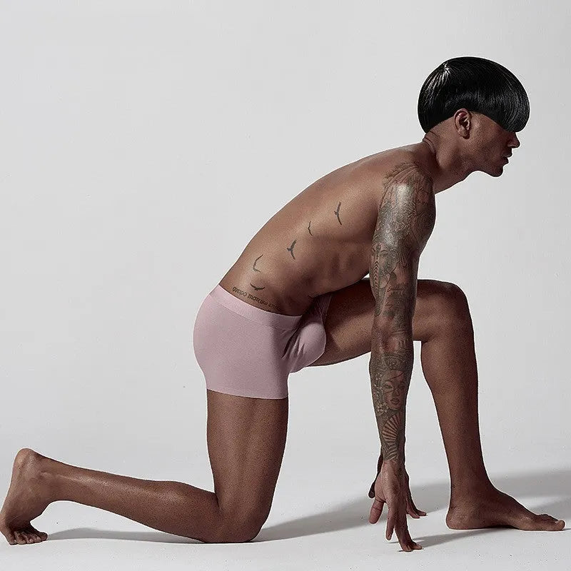 Men's seamless one-piece underwear in modal fabric showing body shaping design in solid colours
