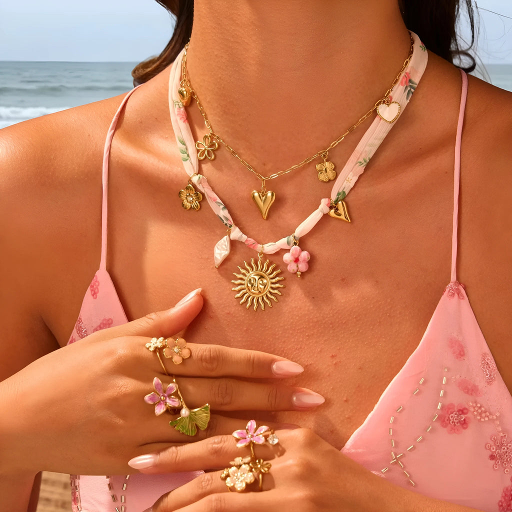 Stainless steel necklace with 18K electroplated geometric pendant on regular chain