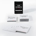 Black box containing Our Time Lovers Edition coated paper communication cards for couples.