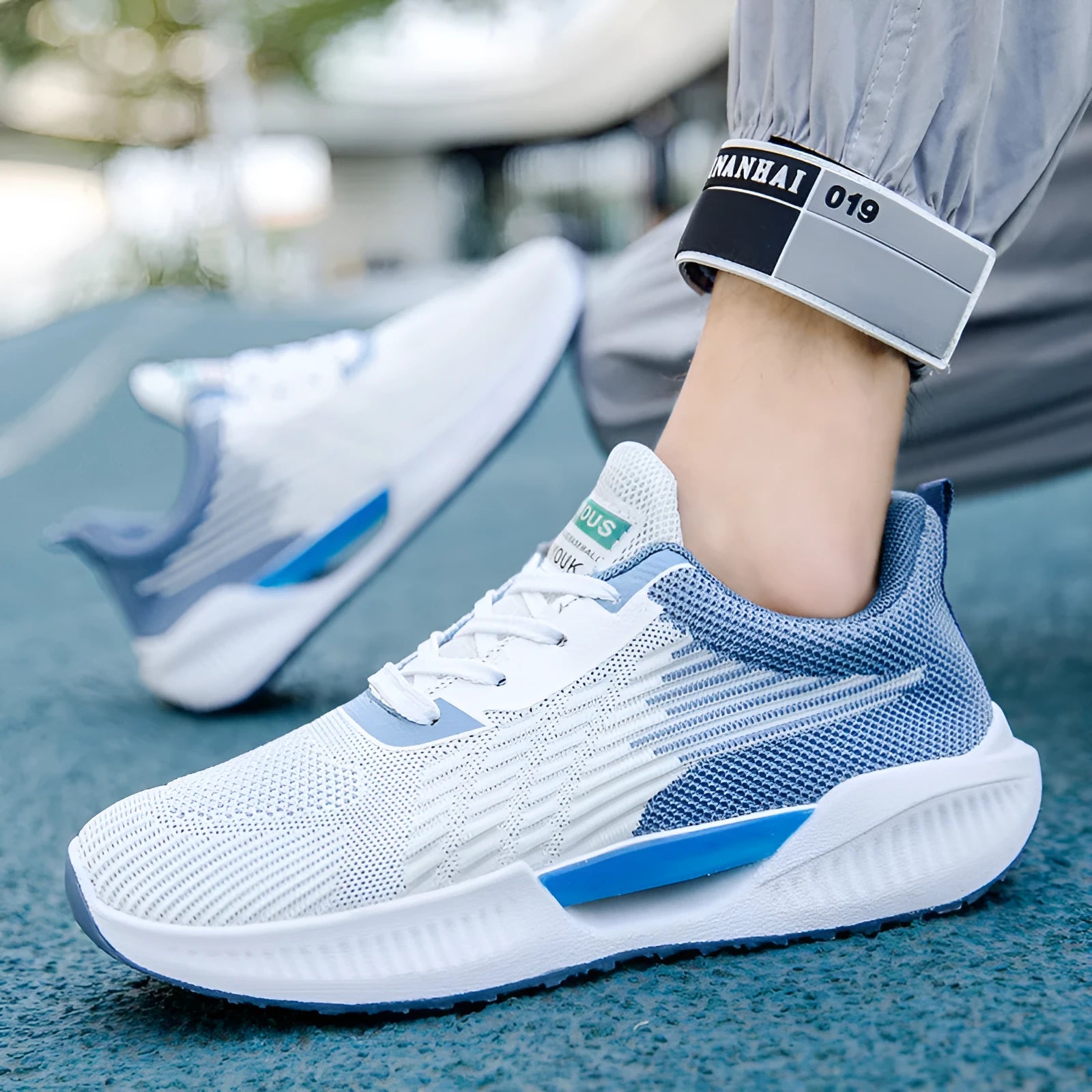 Men's breathable mesh sports shoes in blue, gray, or green with round toe and plastic injection moulded sole