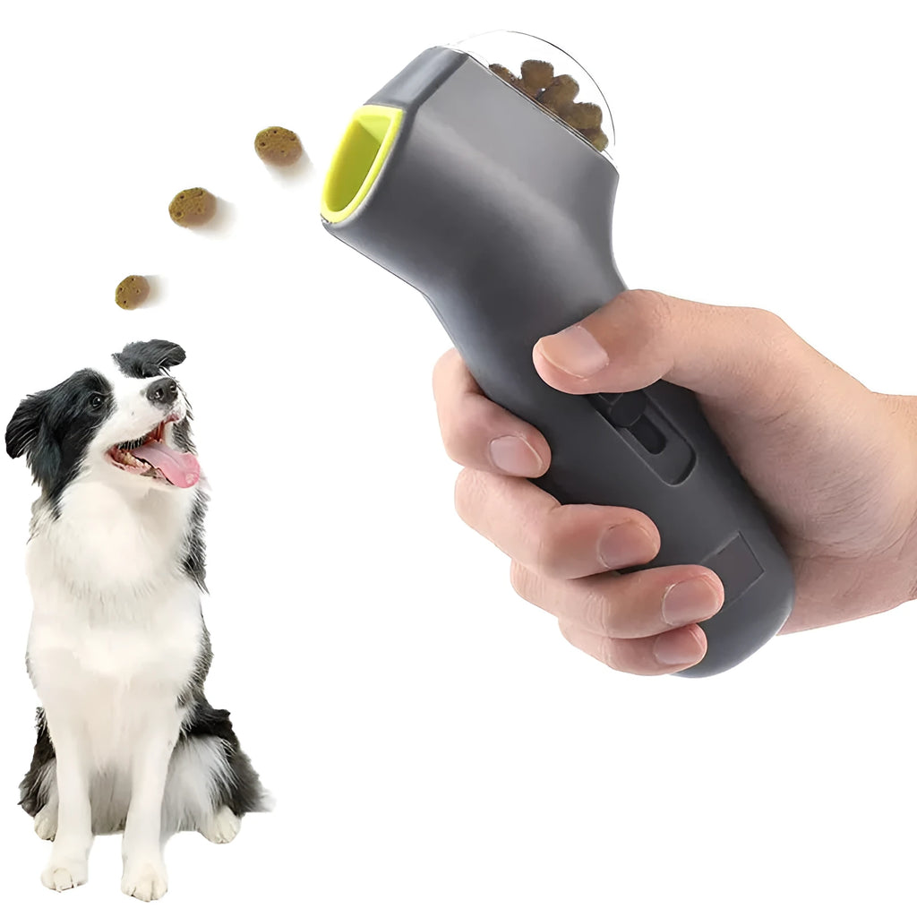 Grey plastic pet treat catapult launcher for dogs and cats on a neutral background
