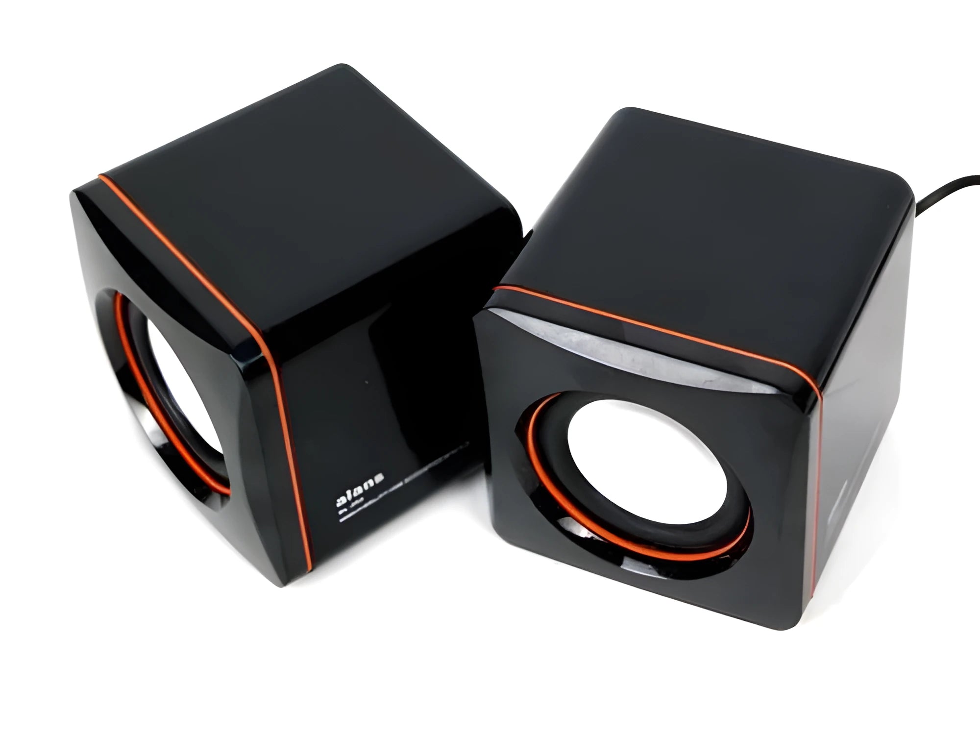 Small black square USB-powered computer speaker with audio and USB cables