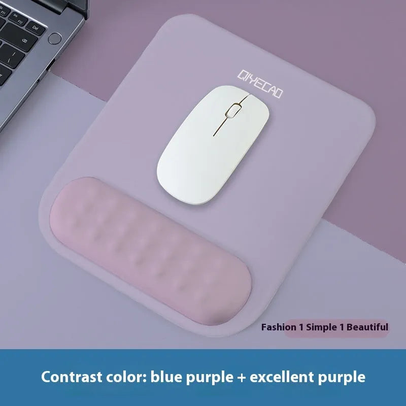 Ergonomic cloth-silicone mouse pad with raised wrist support on a desk