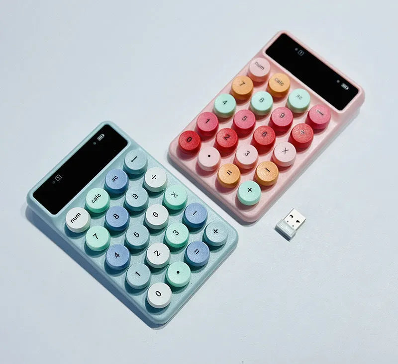 Q3 wireless digital keyboard in macaron colours including mixed black, toner, bright green, and blue options