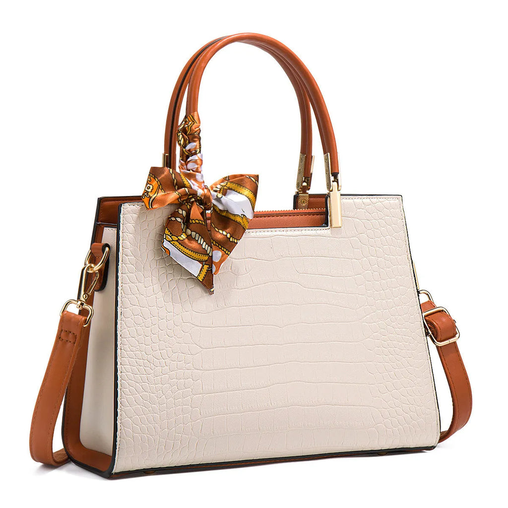 Milky white women's shoulder handbag showing slit pocket and multiple interior compartments