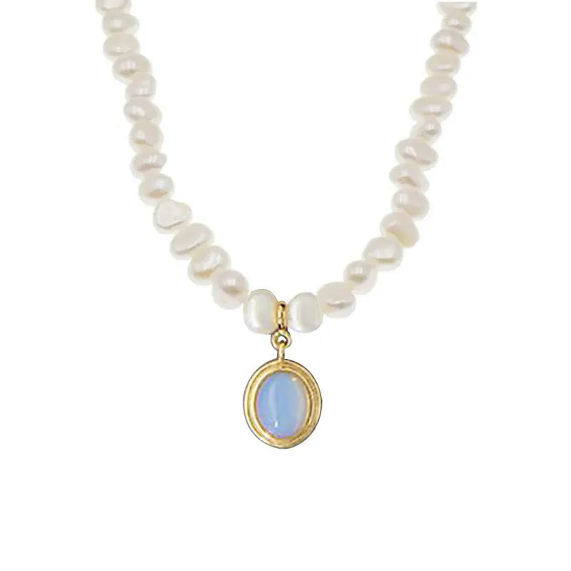 Geometric sterling silver pendant necklace with irregular freshwater pearls on an adjustable silver chain
