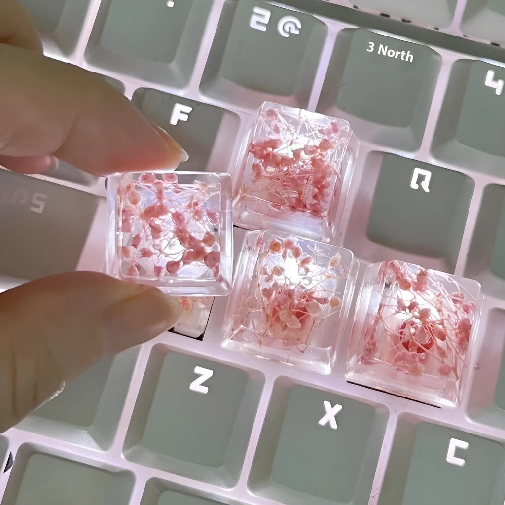 Transparent resin mechanical keyboard keycap with starry sky design in green colour