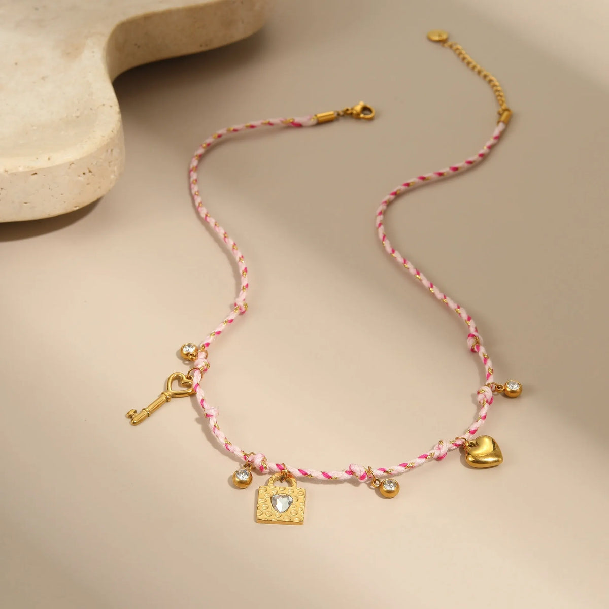 Handmade braided rope titanium steel necklace and bracelet with heart, star, or geometric pendant on a stainless steel chain.
