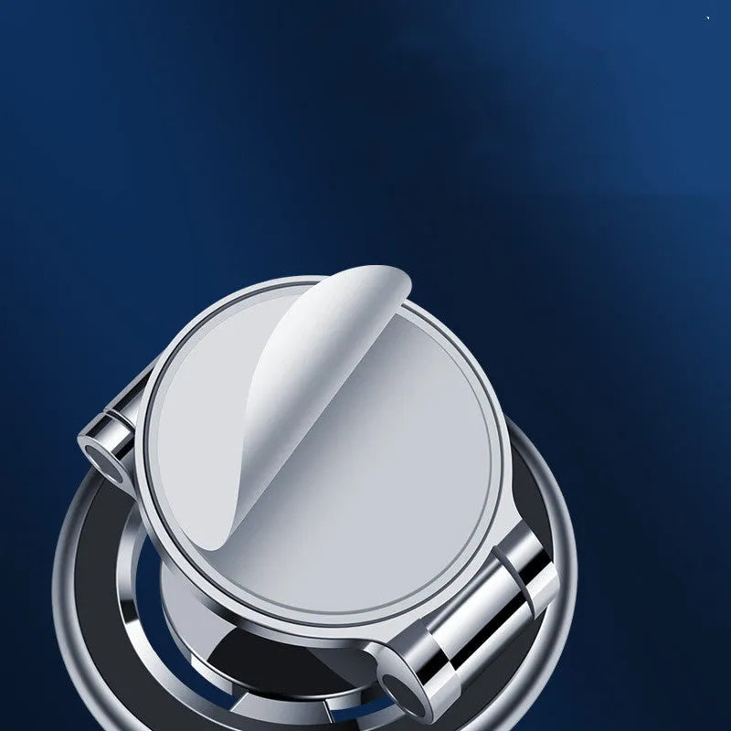 Black car phone holder with magnetic clip fixation mounted on instrument panel showing 360-degree rotation