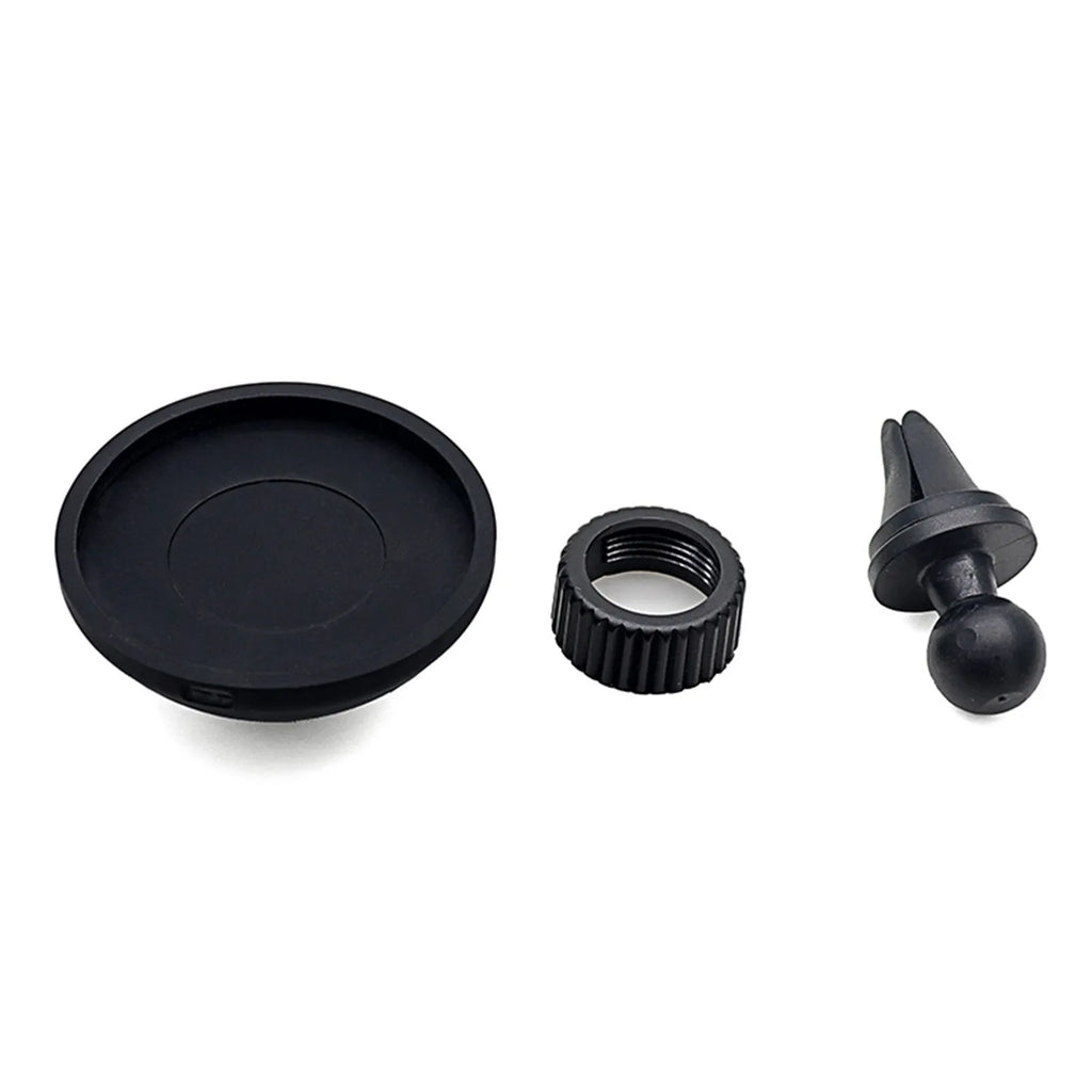 Black magnetic car phone holder mounted on vehicle air vent with smartphone attached, showing 360° rotation capability