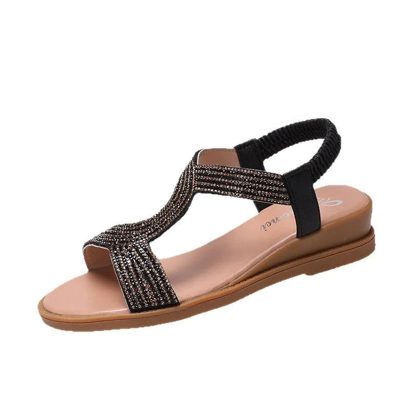 Women's patent leather summer sandals with rhinestone decoration in gold colour