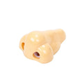 Flesh coloured geometry-shaped plastic manual pencil sharpener on a white background.
