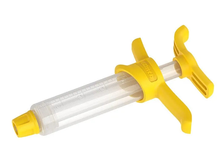 EZmtb bicycle hydraulic disc brake bleed kit with syringes, adapters, and tools on a workbench