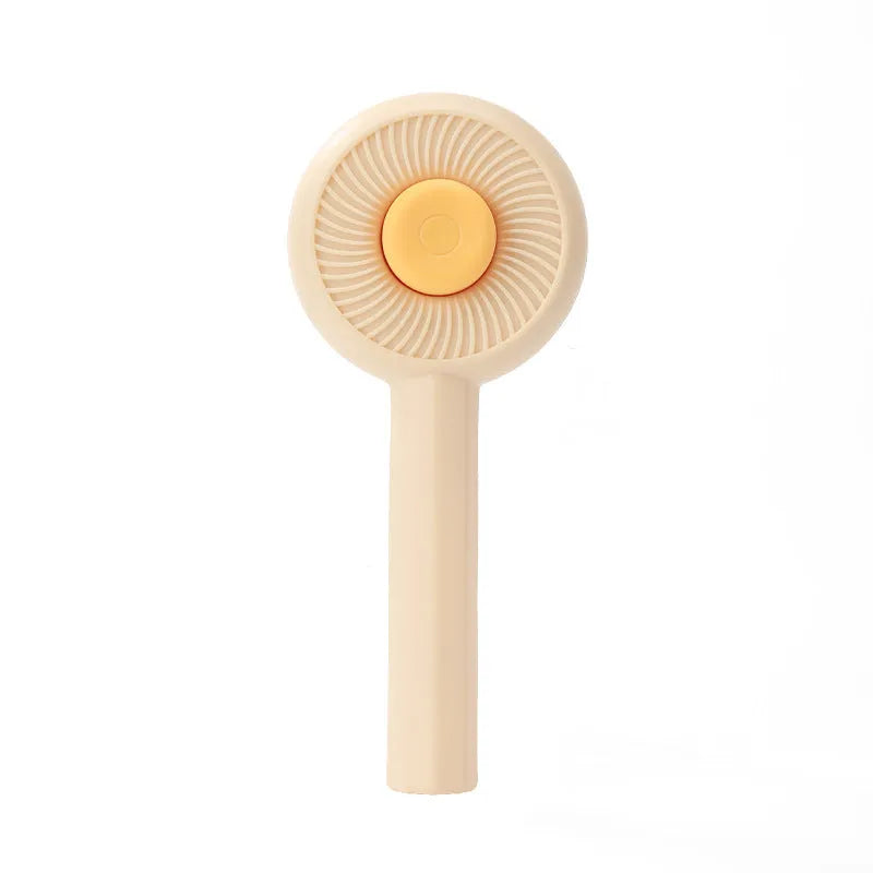 Blue pet grooming brush with metal pins and self-cleaning button for cats and dogs