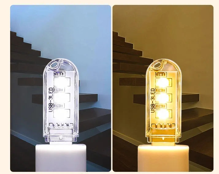 Small white LED night light showing warm and cool light options with USB charging port