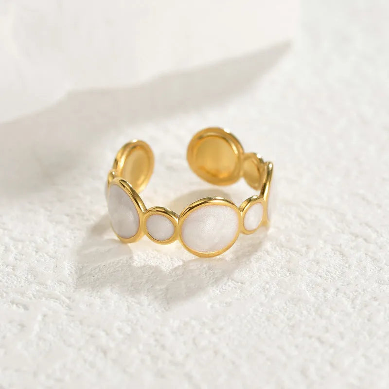 Geometric stainless steel adjustable ring with electroplated metallic finish