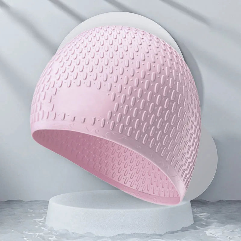 Silicone water drop style swimming cap for adults in various solid colours